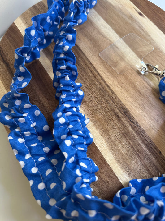 Cordon de téléphone bleu à pois blancs