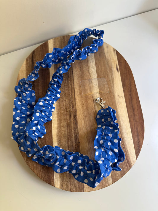 Cordon de téléphone bleu à pois blancs